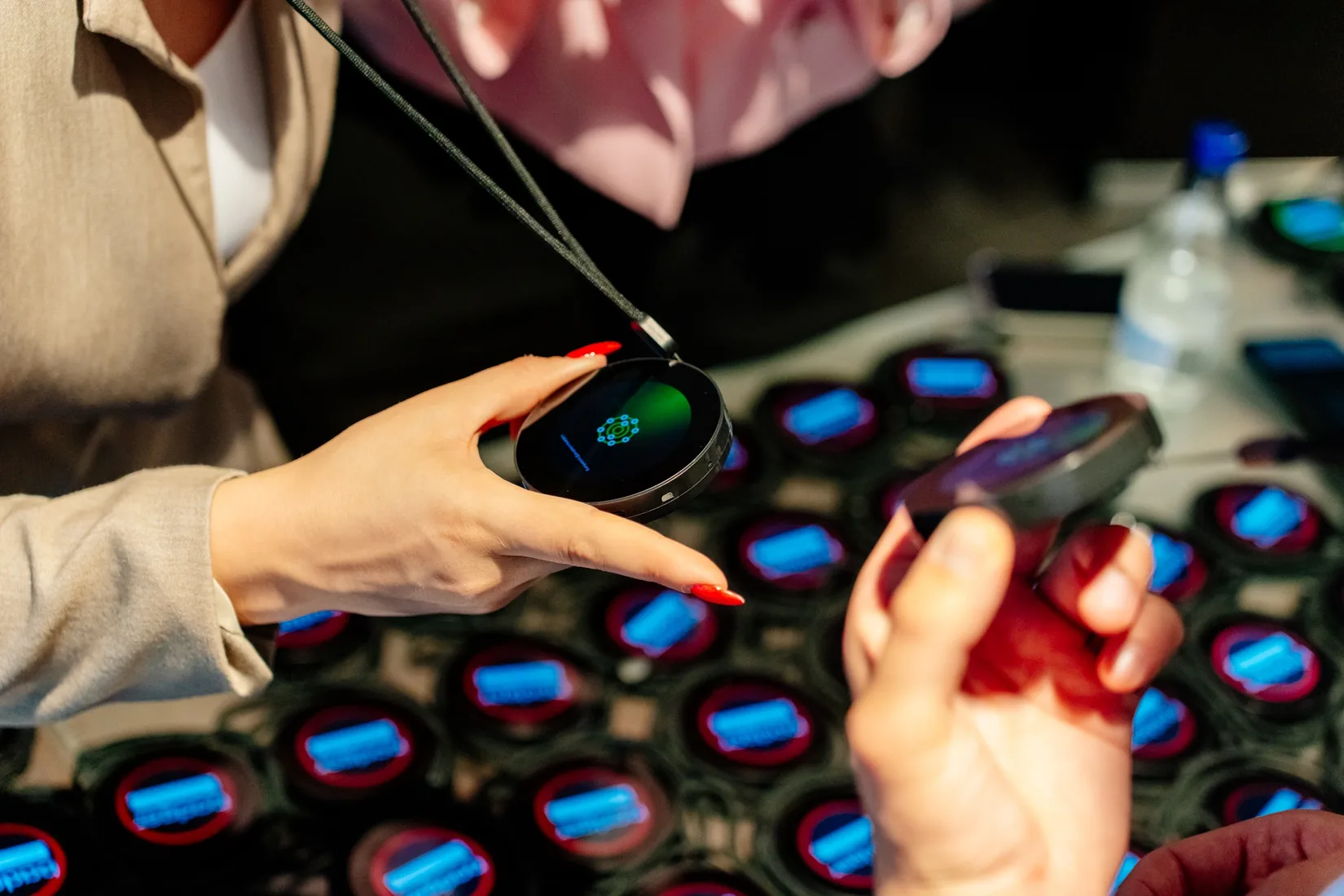 Attendees using real Badger devices at a live business event